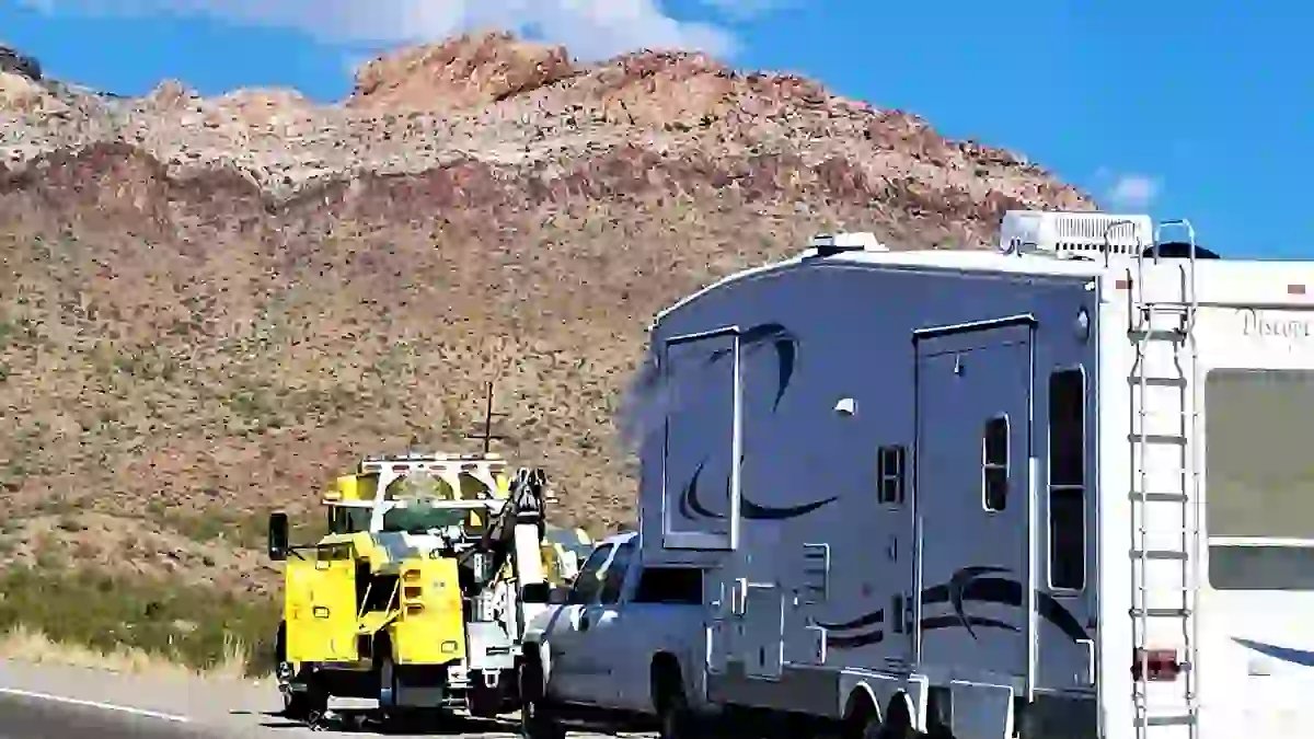 Towing service helping RV on the road